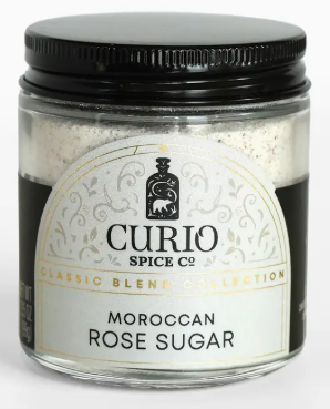 Jar of Moroccan Rose Sugar with 'Curio Spice Co' label on a white background