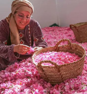 Woman with dried rose petals